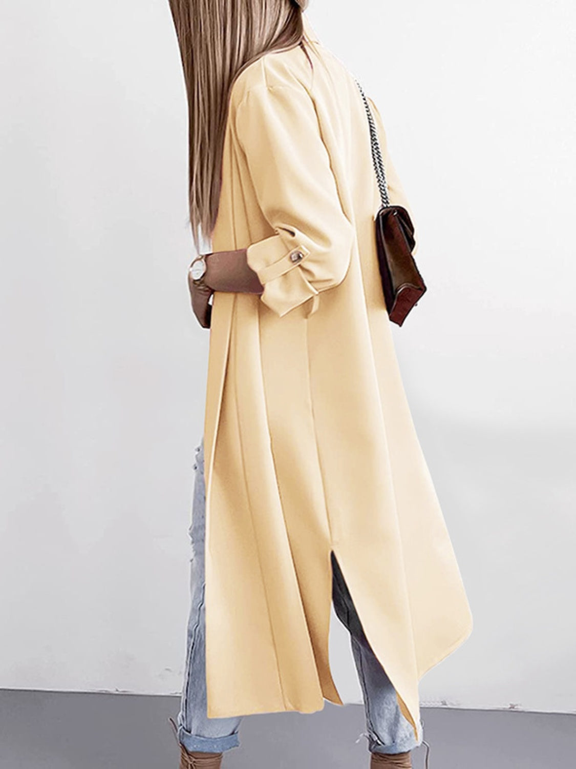 Marianna | Slit trench coat with roll tab sleeves open at the front