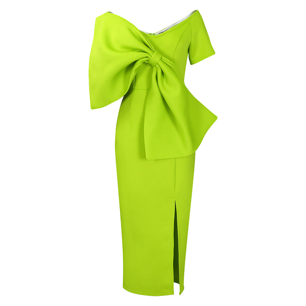 Dress With A Large Bow Slit