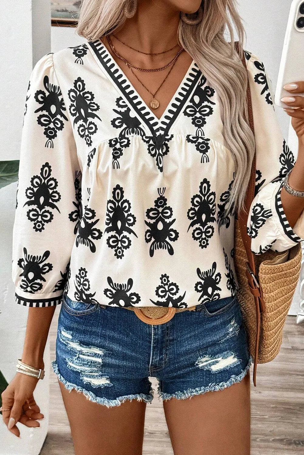 Renata | Printed blouse with three quarter sleeves and V-neck