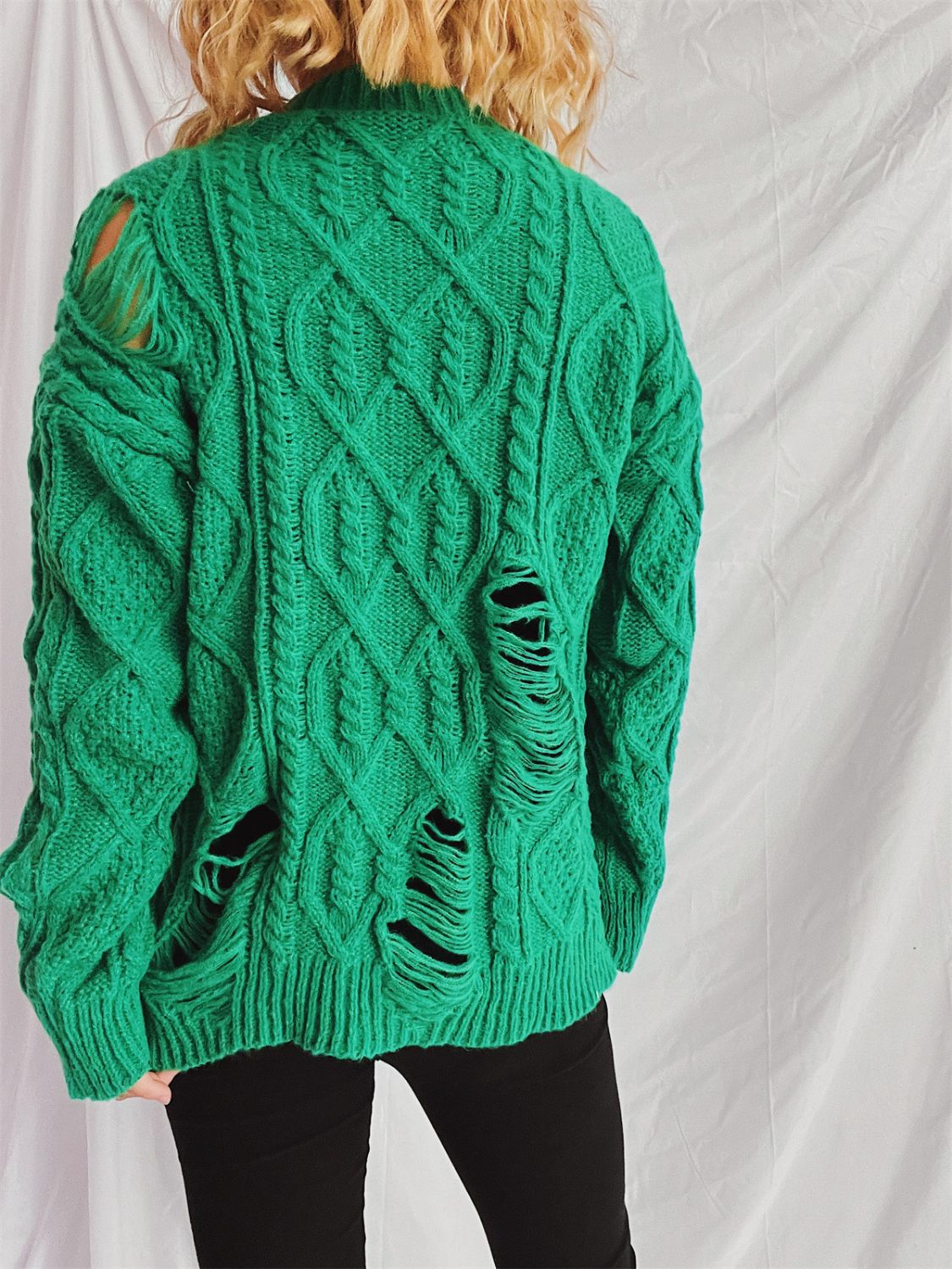 Clara | Long-sleeved, crew-neck, distressed cable-knit sweater