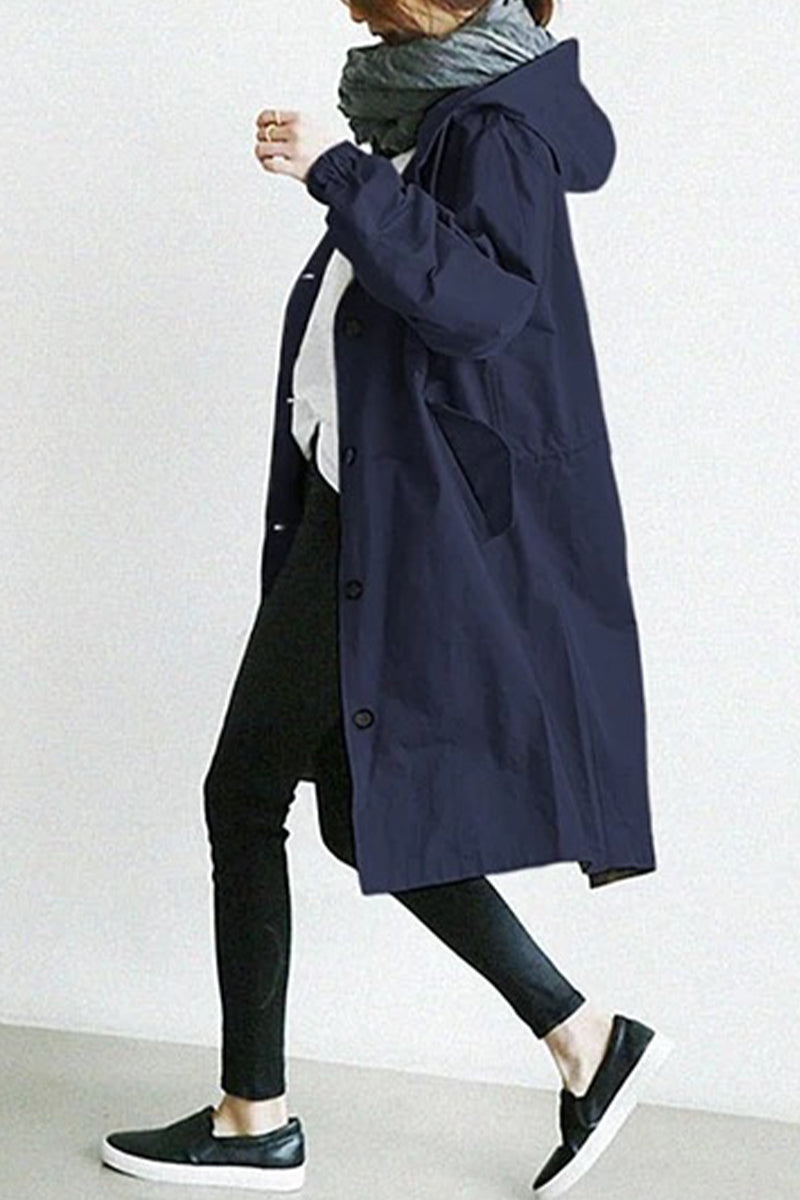 Marcia | British style, solid outerwear with pocket buttons and hooded collar