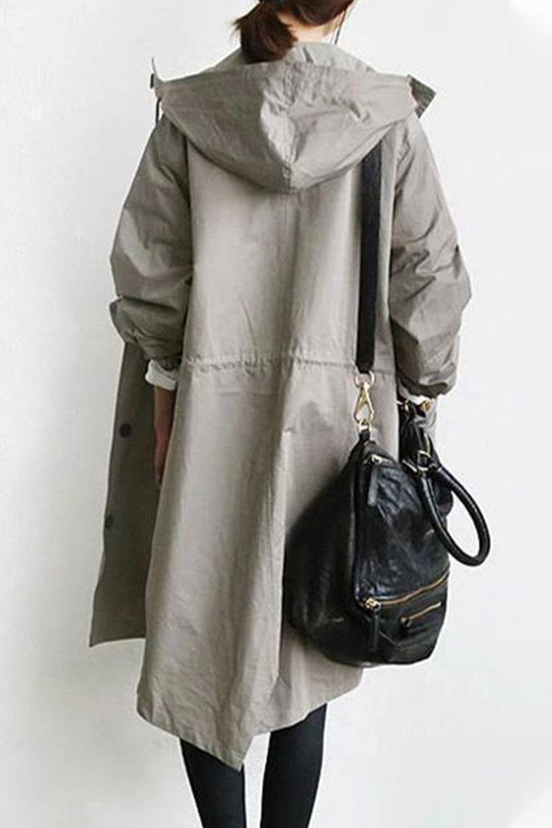 Marcia | British style, solid outerwear with pocket buttons and hooded collar