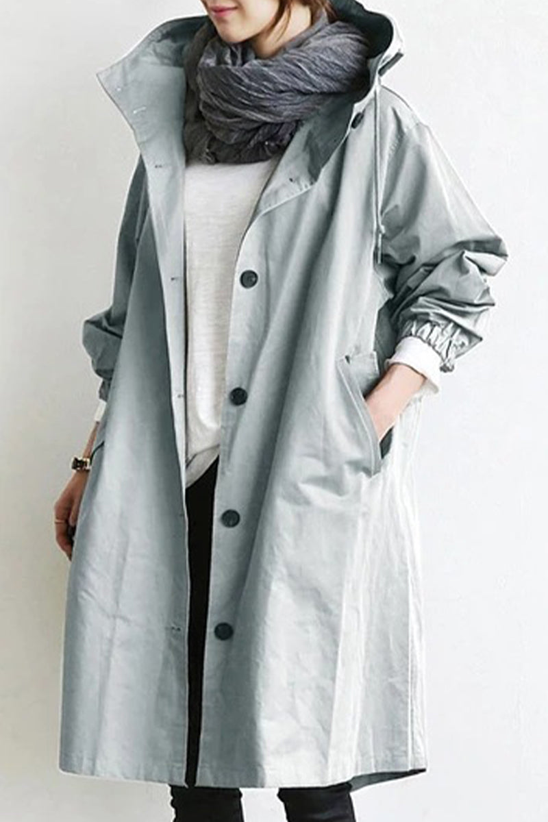 Marcia | British style, solid outerwear with pocket buttons and hooded collar