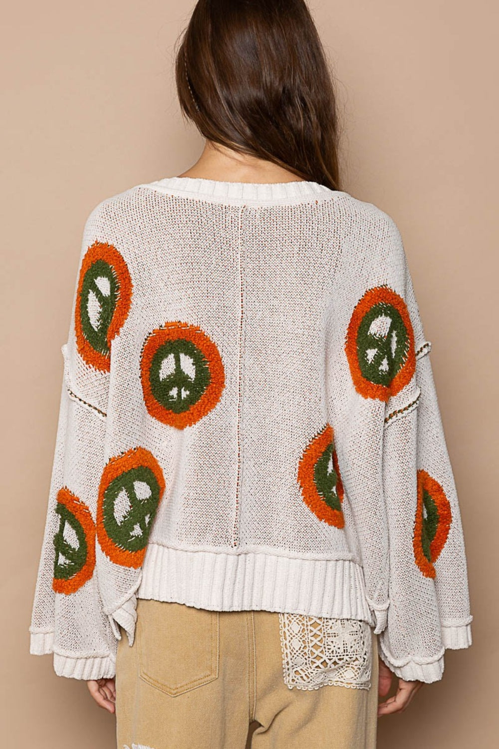 Anya | Long sleeve peace print V-neck sweater