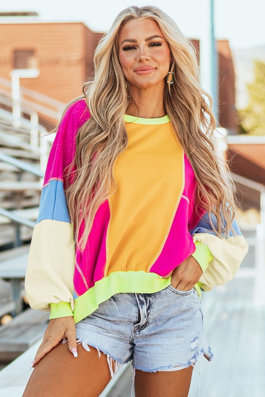 Denise | Women's top with color block patchwork and exposed seams