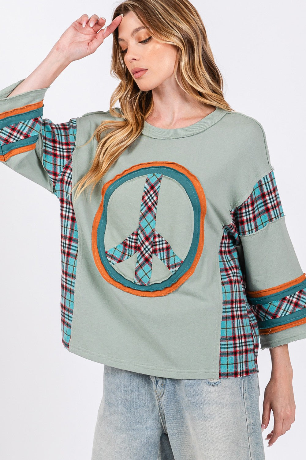 Ariana | SAGE + FIG top with peace appliqué patch and contrast check