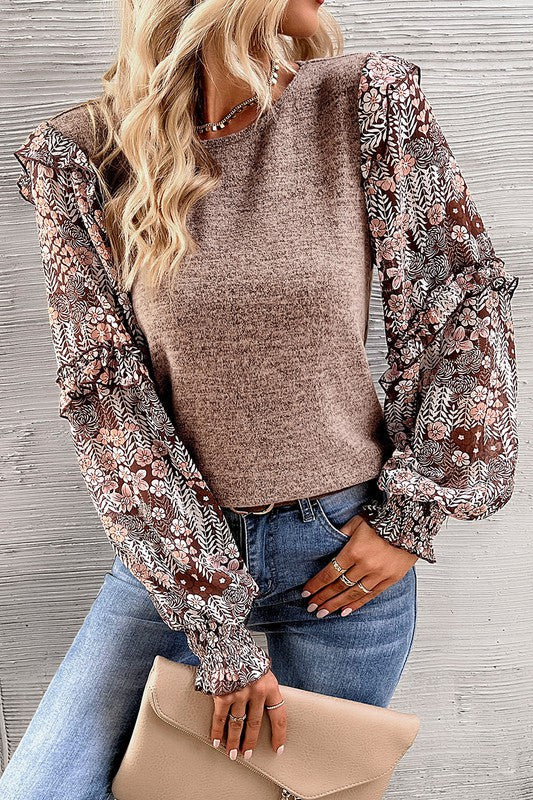 Aitana | Ruffled blouse with tiered floral sleeves and round neckline