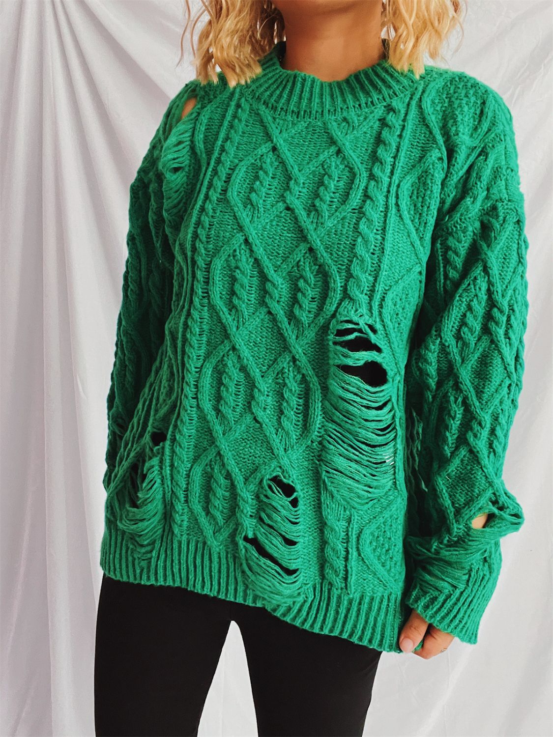 Clara | Long-sleeved, crew-neck, distressed cable-knit sweater