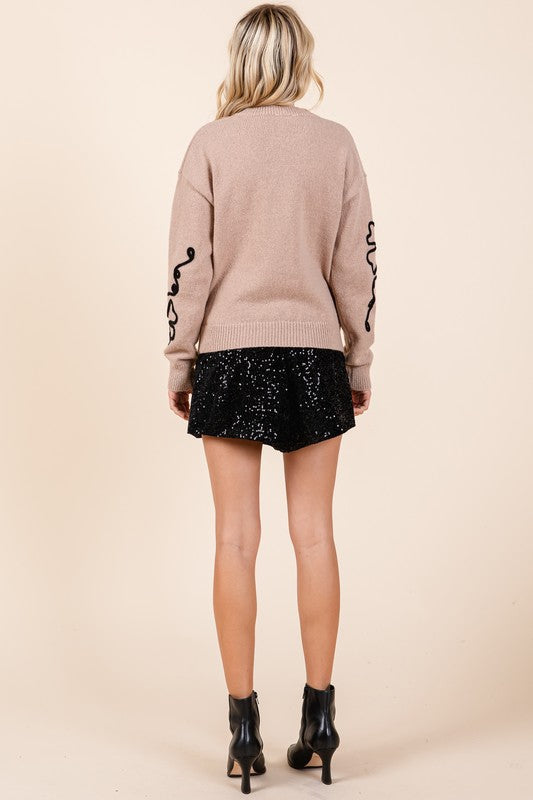 Cecilia | Plus knitted sweater with floral embroidery