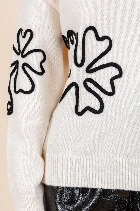 Cecilia | Plus knitted sweater with floral embroidery