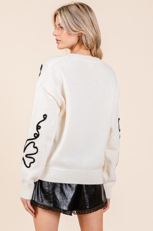 Cecilia | Plus knitted sweater with floral embroidery