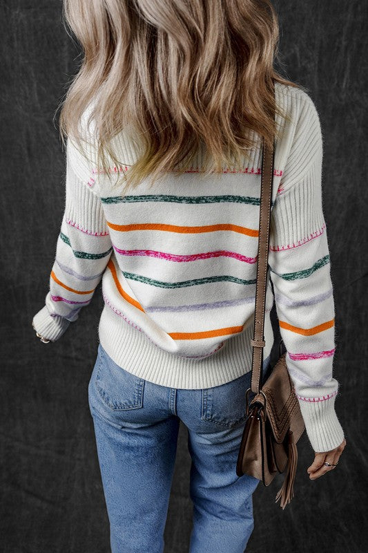 Gabrielle | White, colorful striped sweater with a ribbed hem