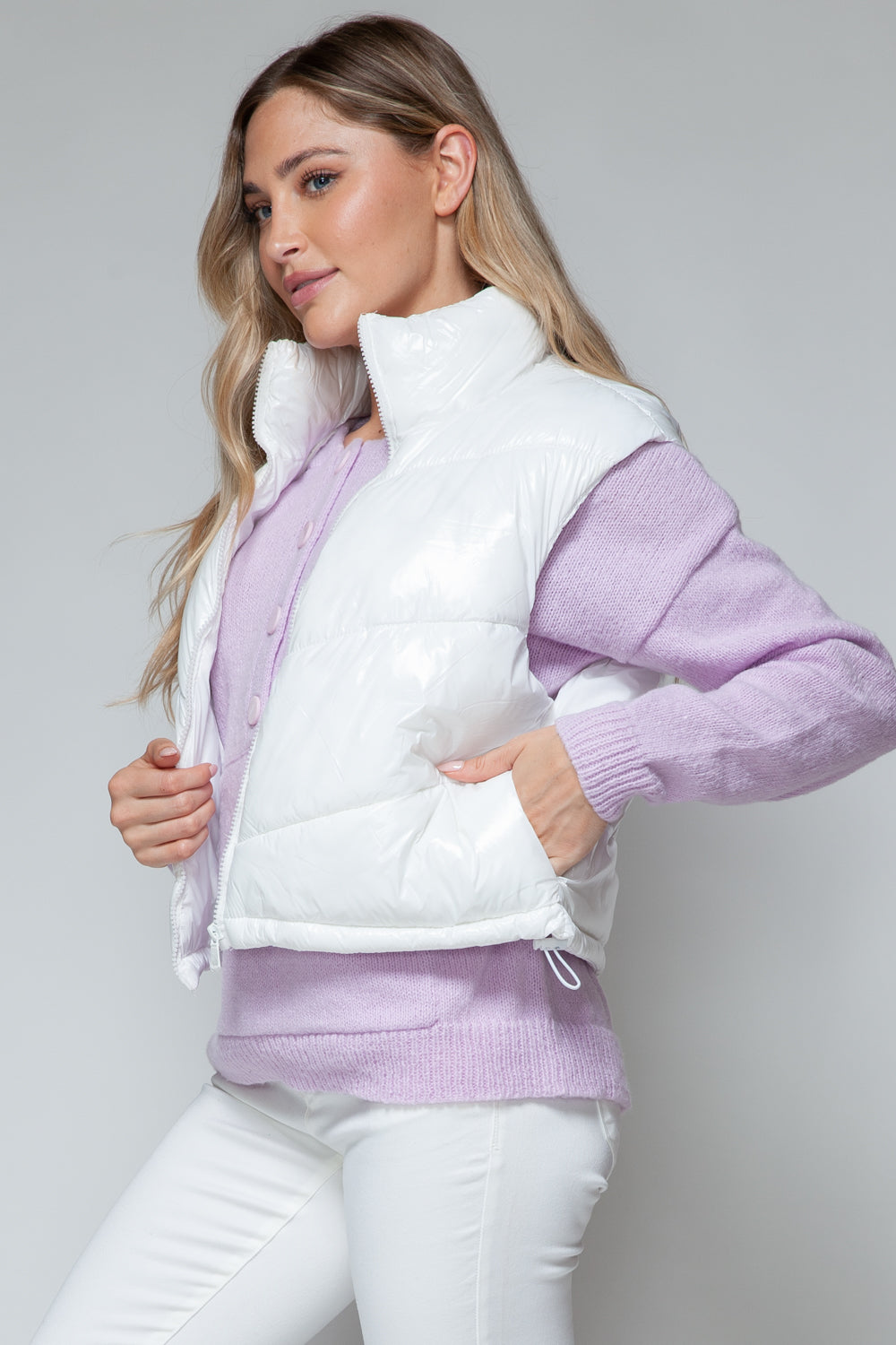 Milagros | Snobish shiny quilted vest with turtleneck and zip