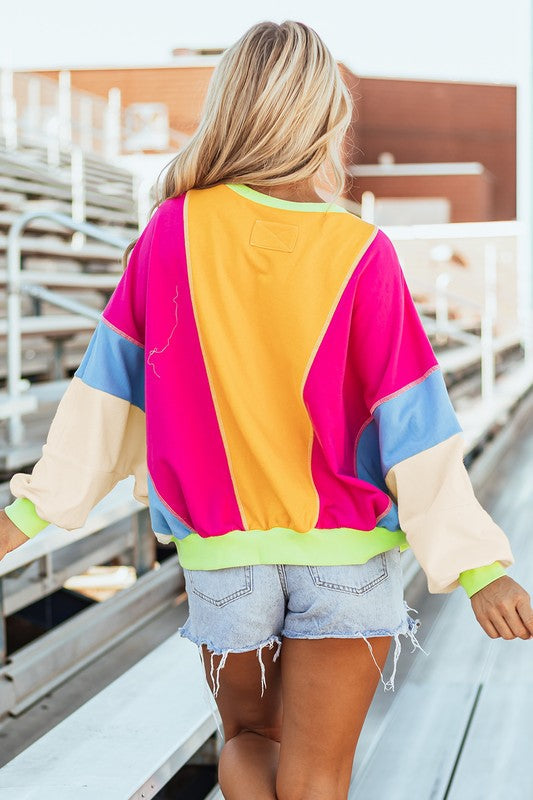 Denise | Women's top with color block patchwork and exposed seams