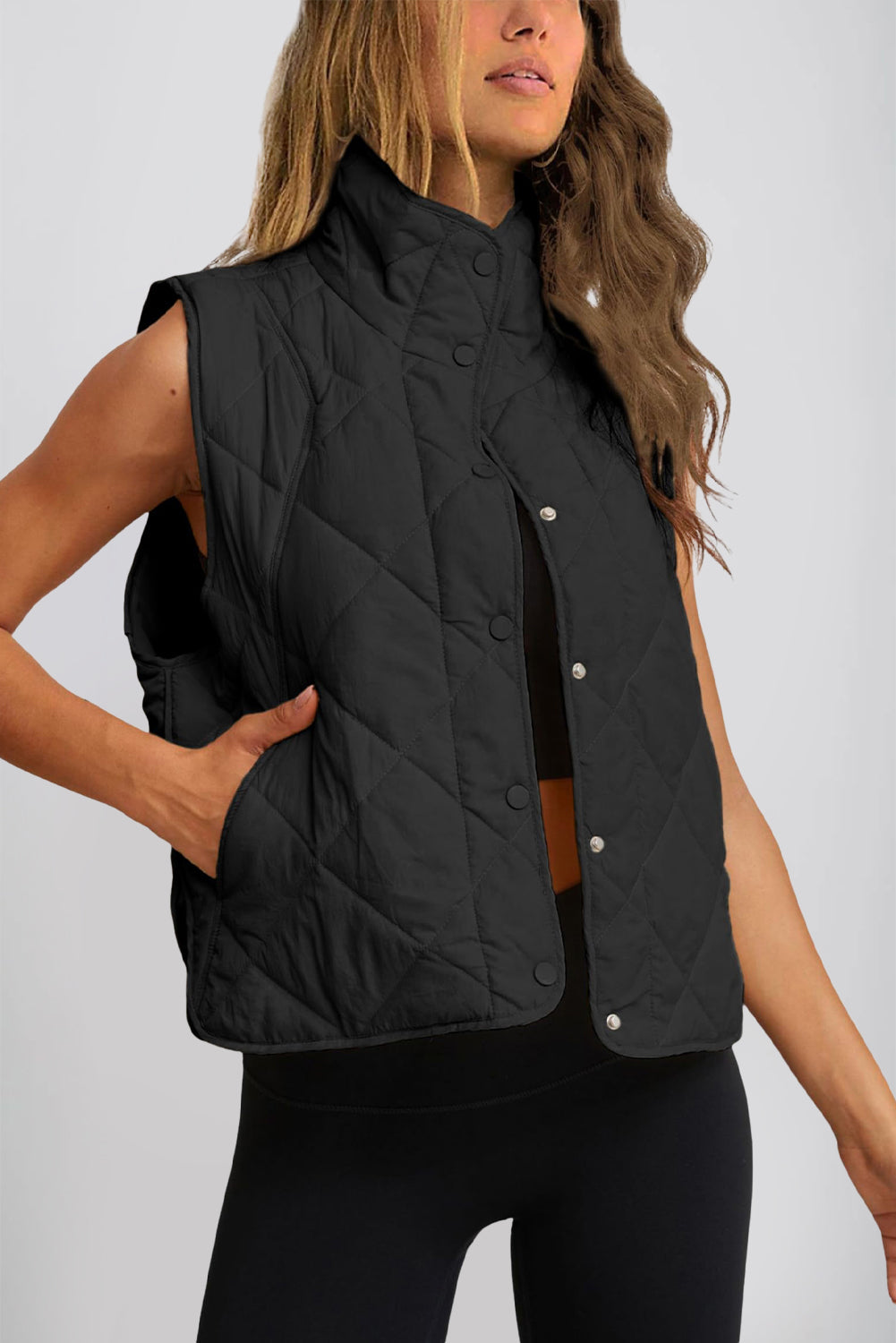 Maite | Vest with snap-down structure and pockets