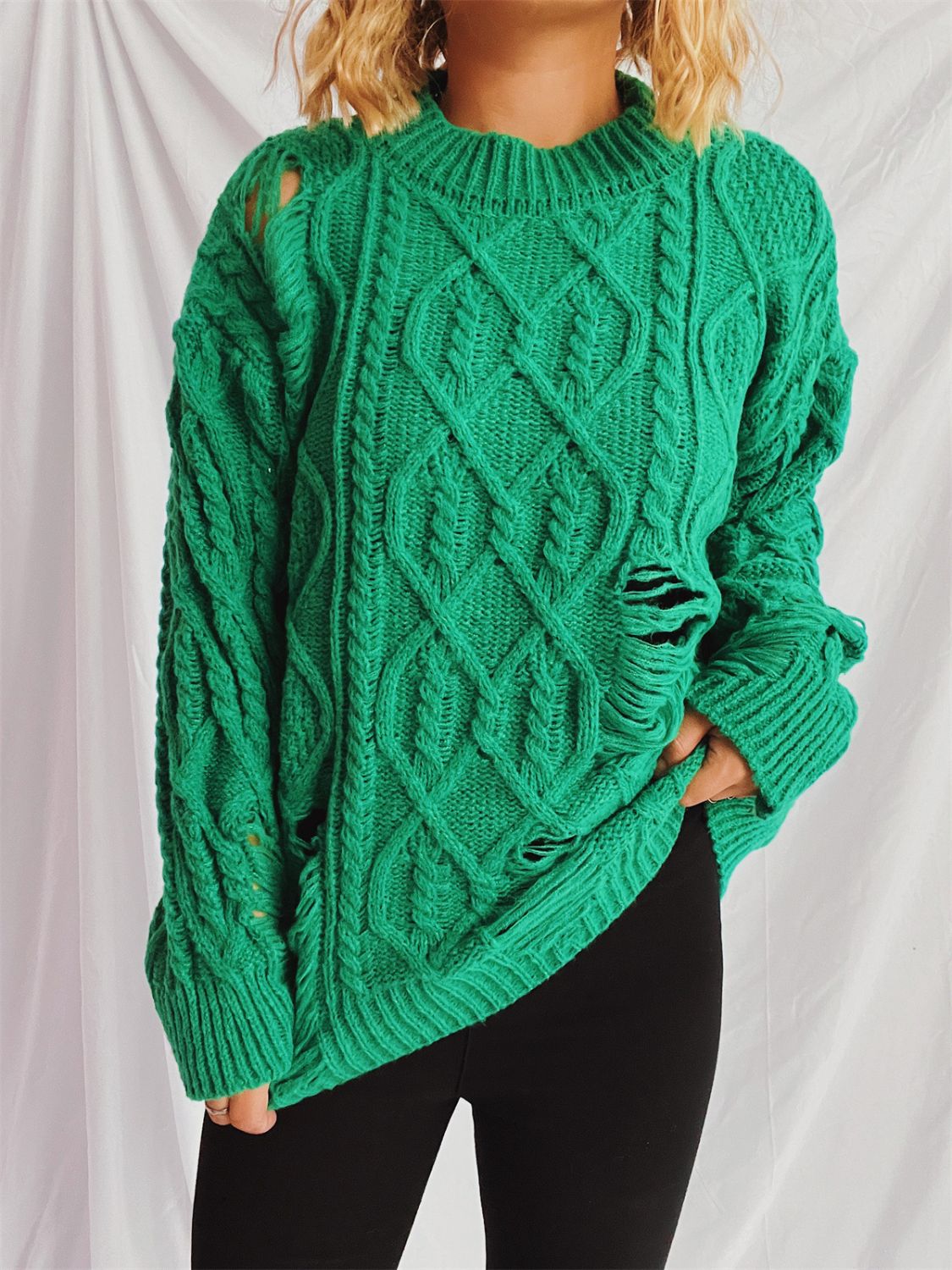Clara | Long-sleeved, crew-neck, distressed cable-knit sweater