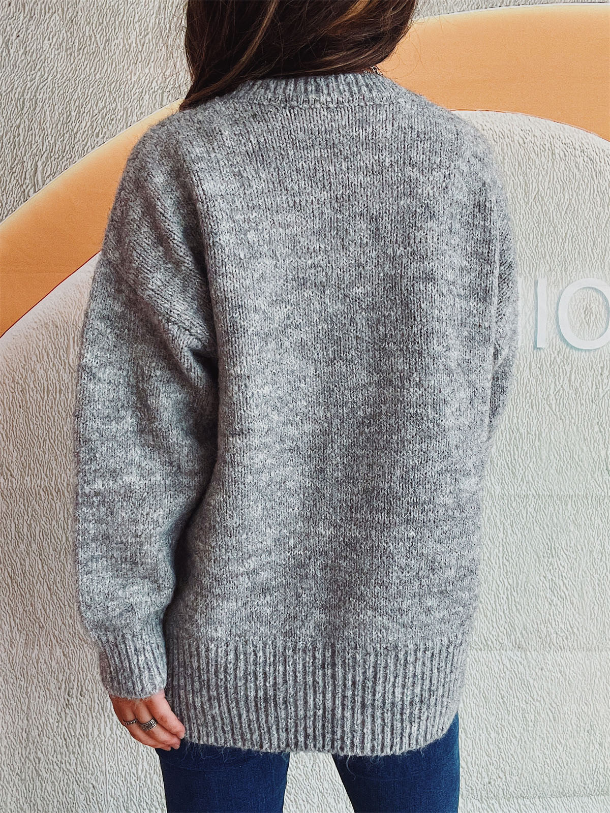 Larissa | Long-sleeved sweater with a slit and beaded trim and a crew neck