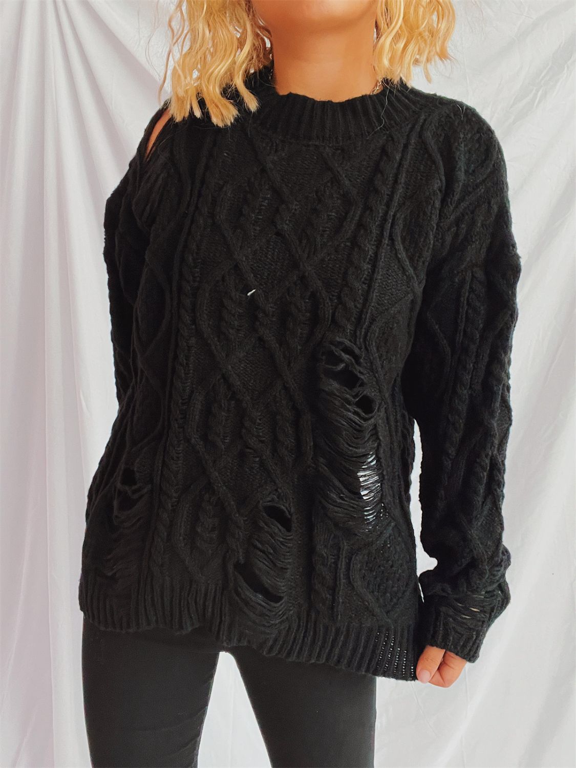 Clara | Long-sleeved, crew-neck, distressed cable-knit sweater