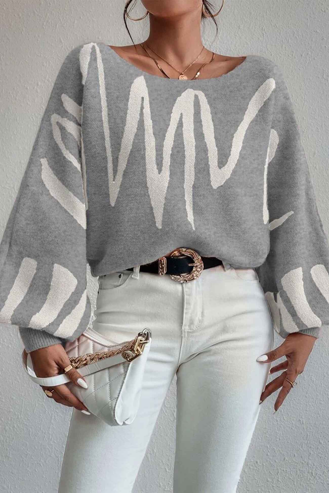 Anika | Knitted sweater with geometric lantern sleeves