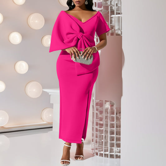 Dress With A Large Bow Slit