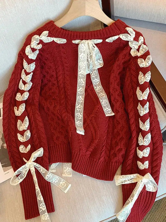 Julia | Warm knitted sweater with lace threads and bow for women