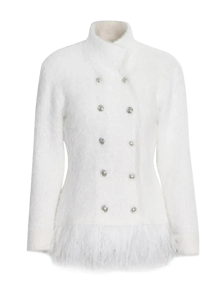 Natividad | Patchwork blazer with feather accessories