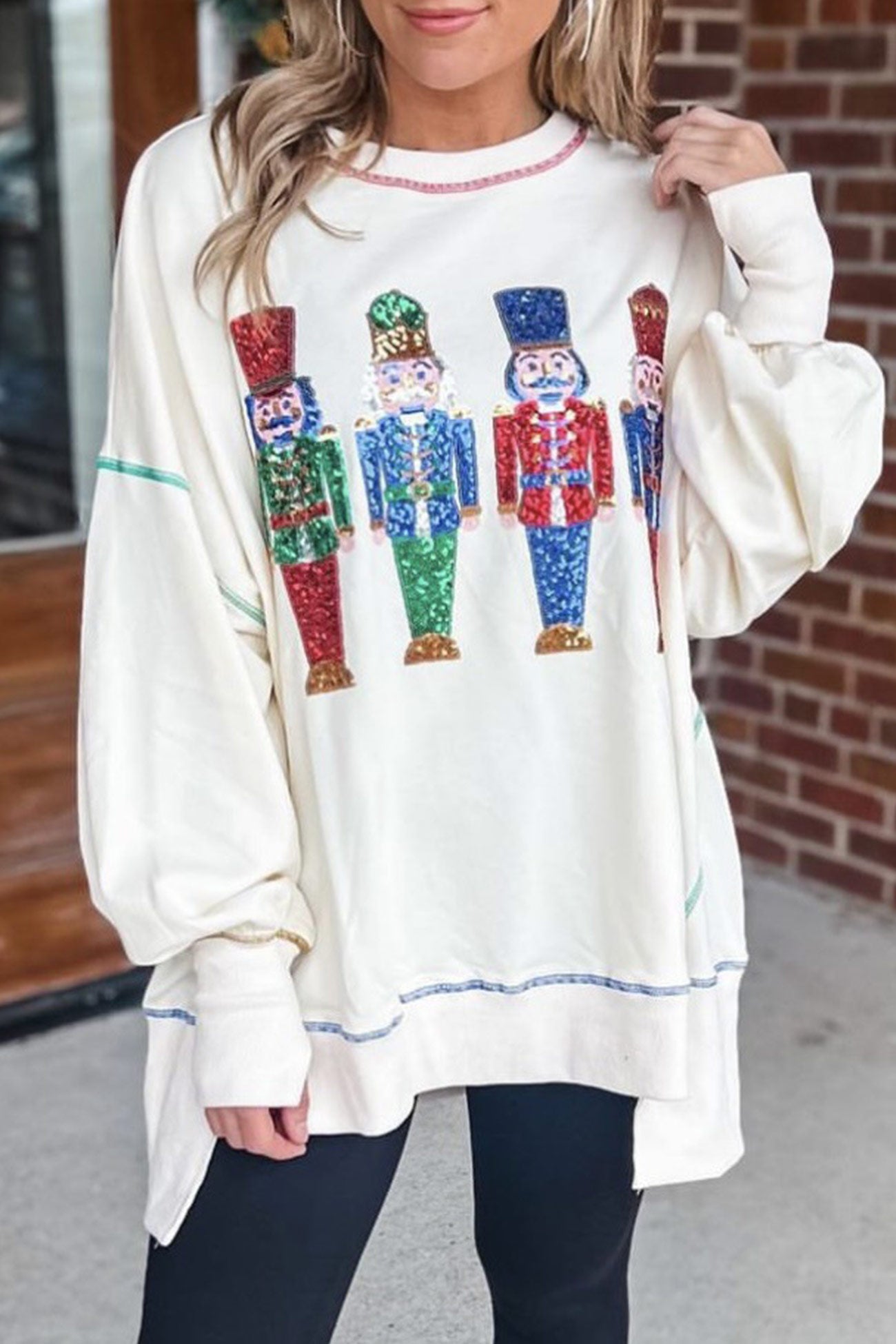 Dominique | Sequin graphic sweatshirt with slit hem