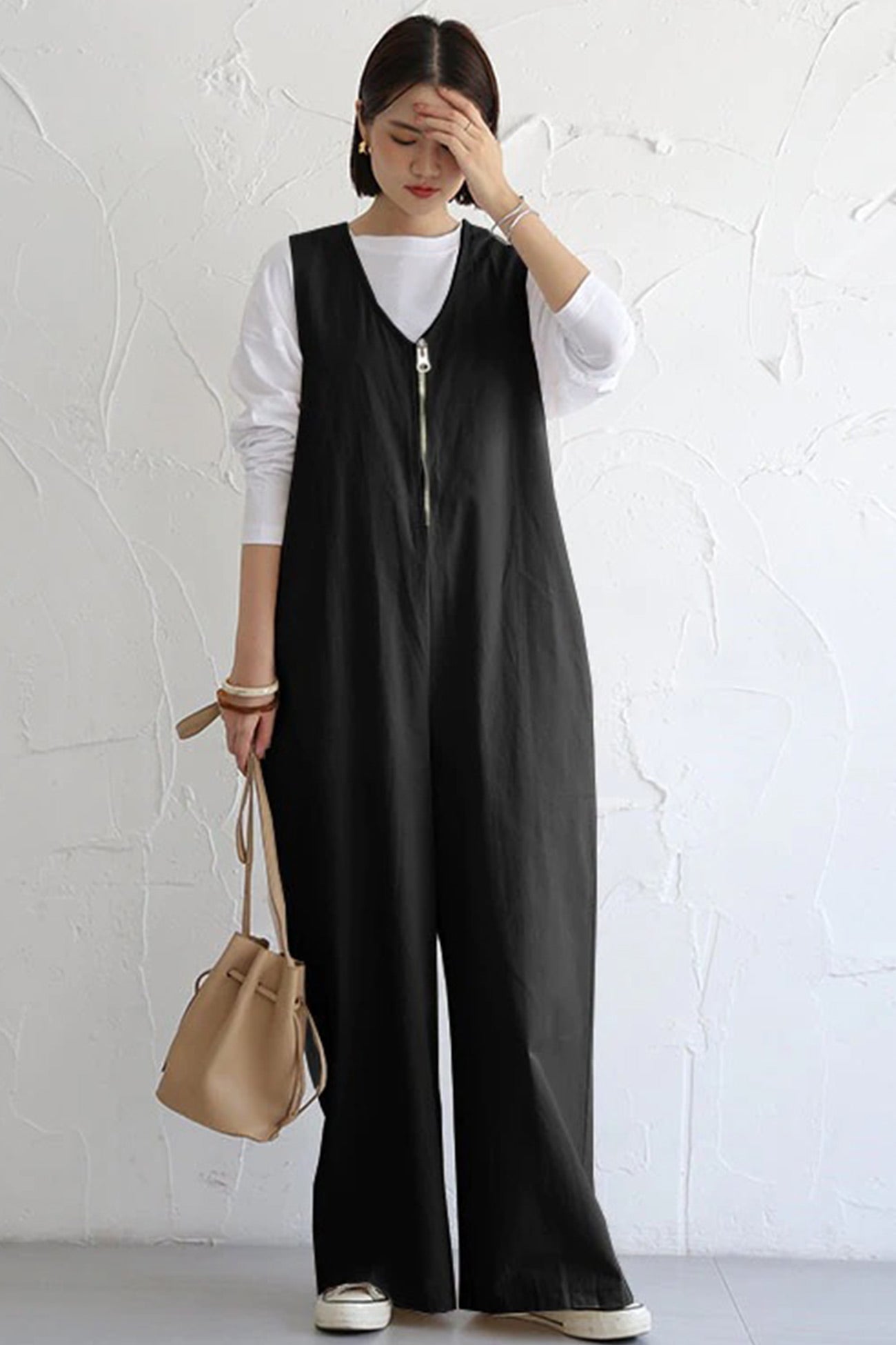 Clara | Sleeveless wide leg jumpsuits with zip front closure
