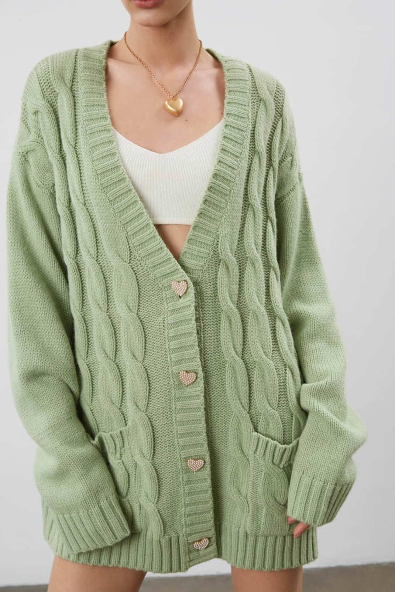 Pilar | Solid single breasted cable knit cardigan