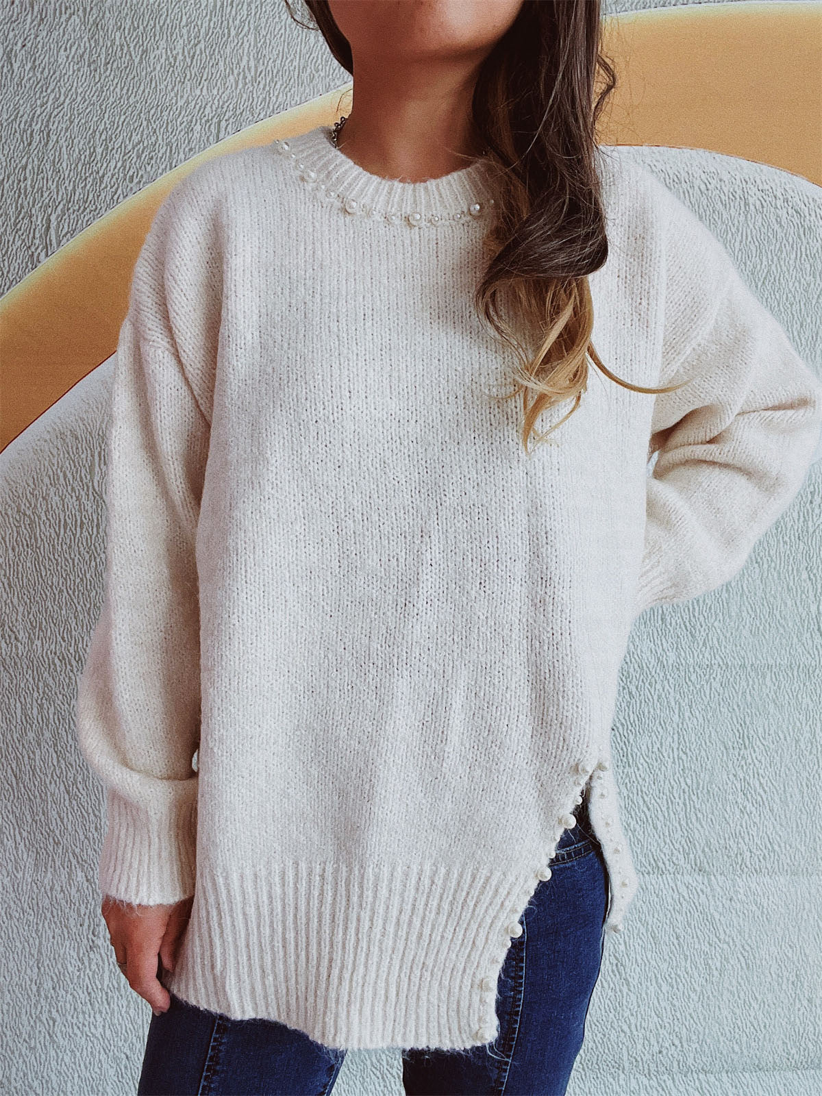 Larissa | Long-sleeved sweater with a slit and beaded trim and a crew neck