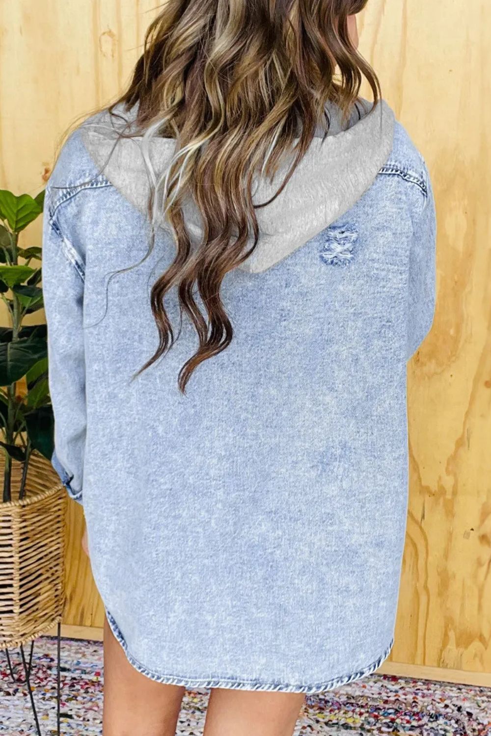 Aurora | Long-sleeved distressed button-down denim jacket