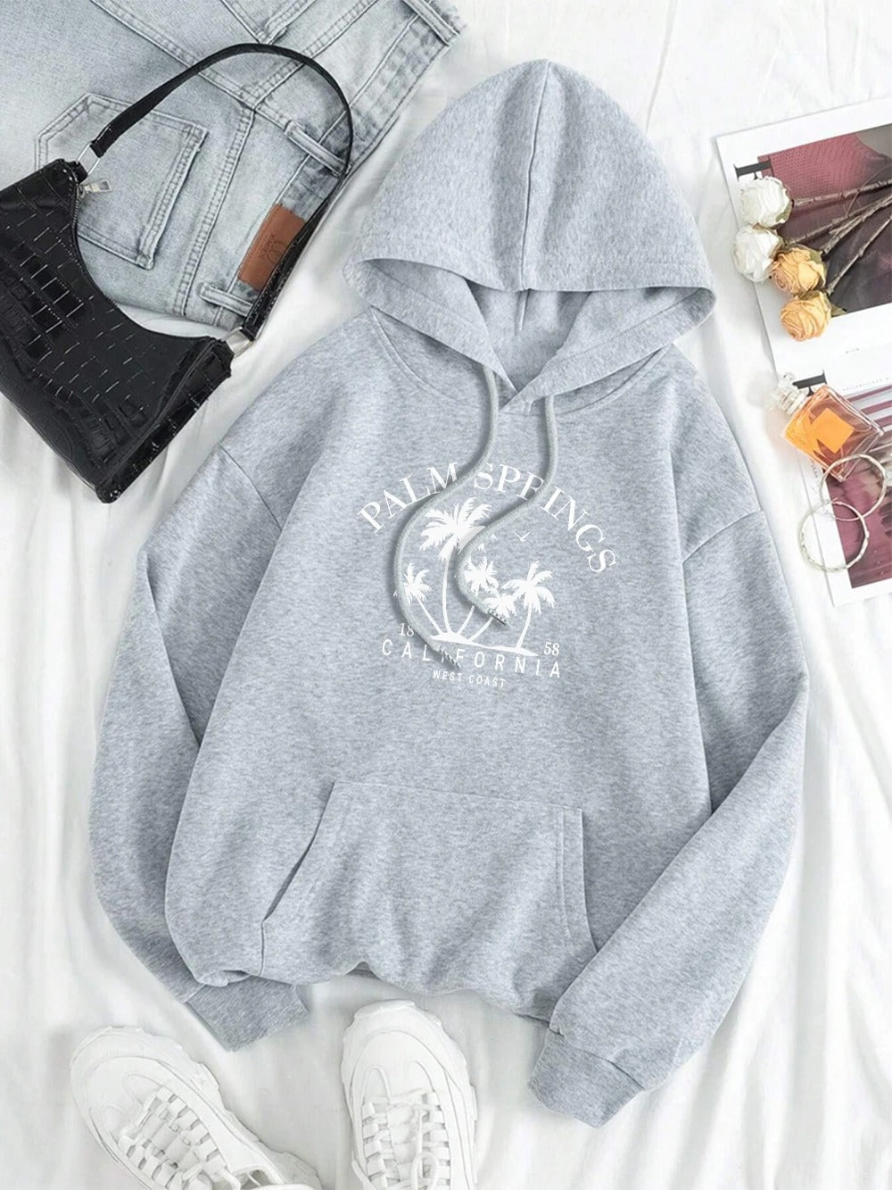 Carla | Oversized hooded sweatshirt with smile print
