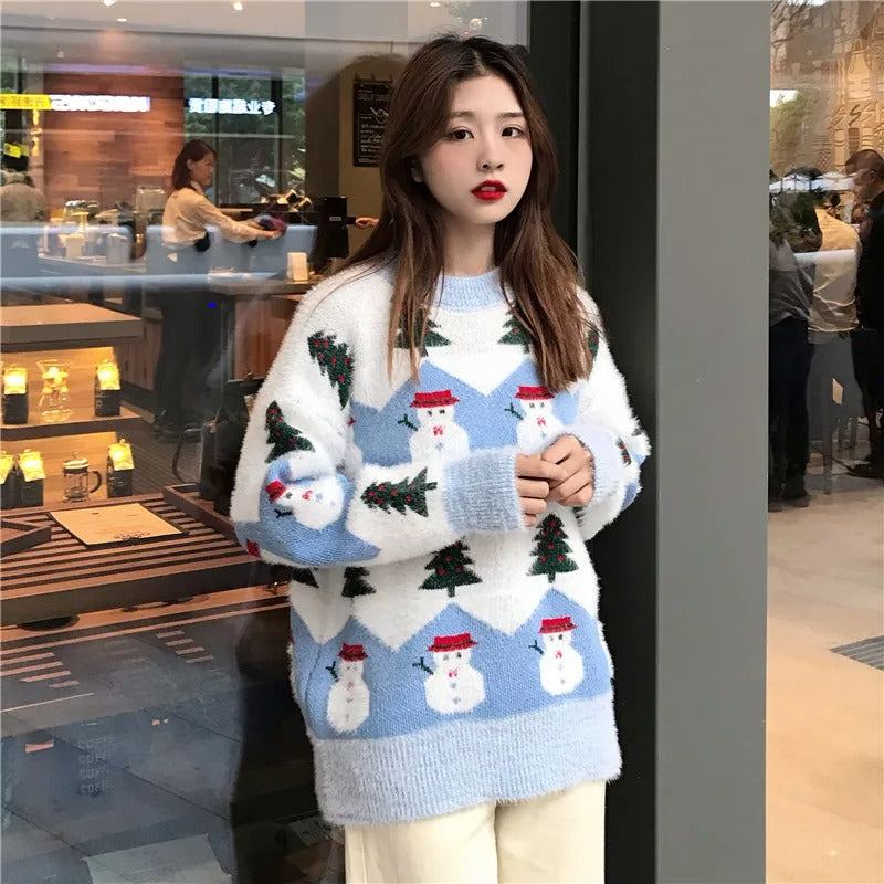 Celia | Christmas sweater with Santa Claus and Christmas tree motifs